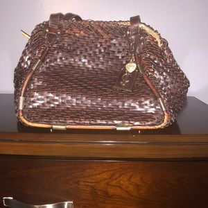 Gently used basket woven hand bag